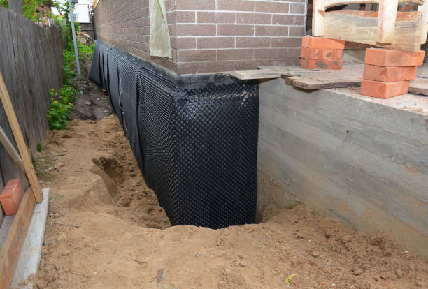 Happy homeowners after waterproofing job in Pullman